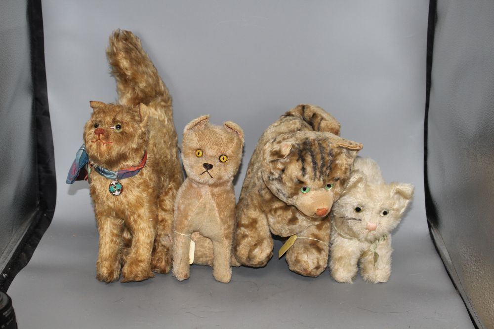 A collection of modern teddy bears and soft toys